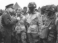 Supreme Allied Commander U.S. General Dwight D. Eisenhower addresses troops.