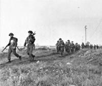 Winnipeg Rifles advance inland.